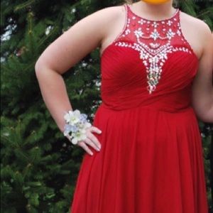 One of a kind red prom dress with mesh neckline and silver beading